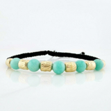 Pulsera Tejida Negra Morralla Esmeralda 5Uni Oro Amarillo 18K