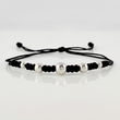Pulsera Negra Secuencia Lisa 5und / 3mm-5mm Oro Blanco 18K  (A.C)