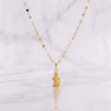 Set Cadena Flor Espejo + Dije Ángel de la Guarda / 1.25g / 18 in Oro Amarillo 18K