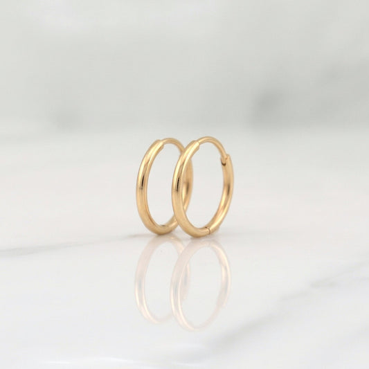 Candongas Aro Liso 0.3g / 1/4 in Oro Amarillo 18K