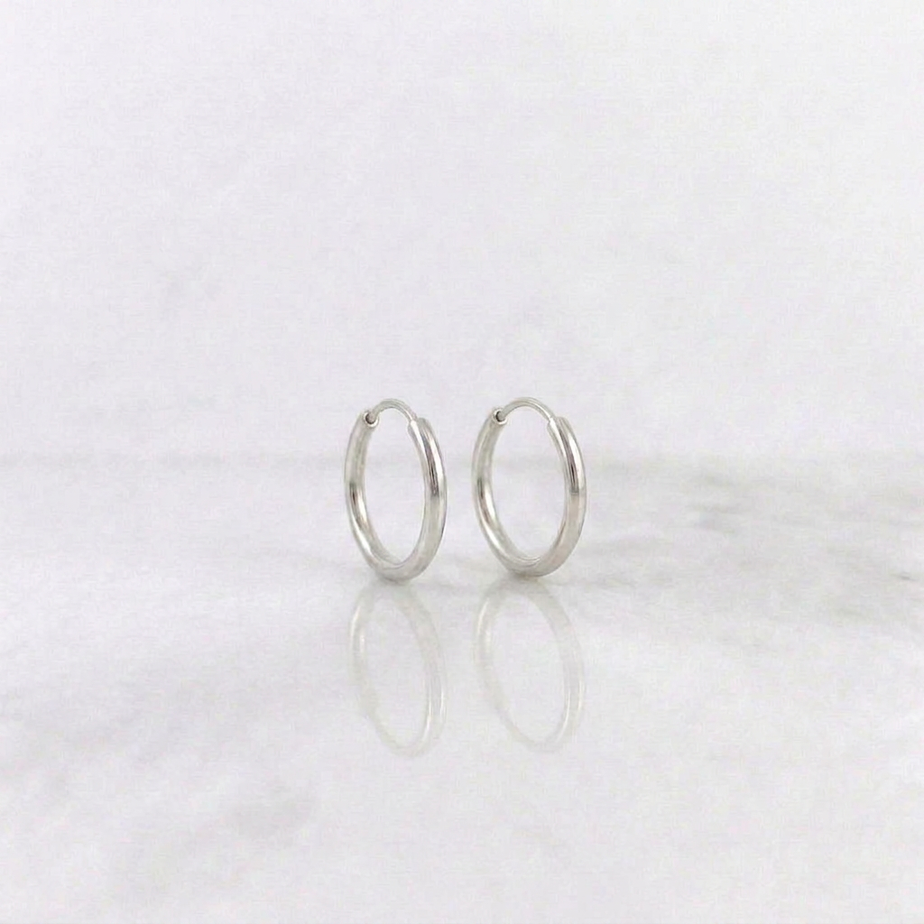 Candongas Aro Liso 0.4gr / 1/2 in / Oro Blanco 18K
