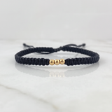 Pulsera Negra 3mm 3 Und Bolas Lisas Oro Amarillo 18K (A.C)