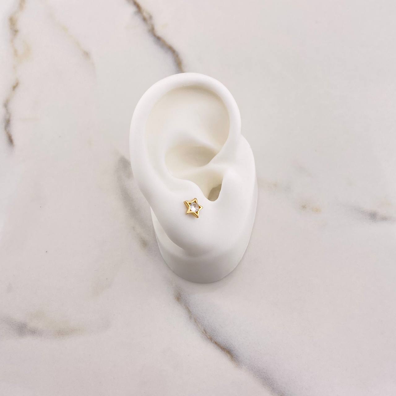 Topos Estrella 0.85gr / Circon Blanco Oro Amarillo $