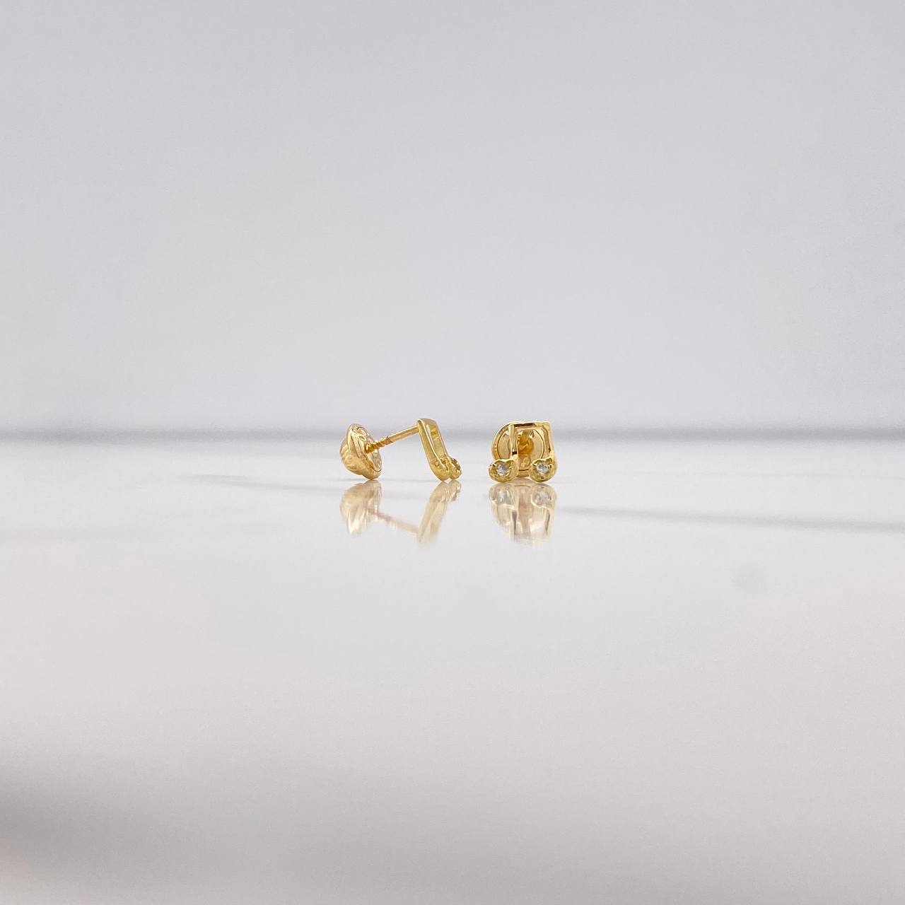 Topos Nota Musical 0.7gr / Circones Blancos Oro Amarillo $