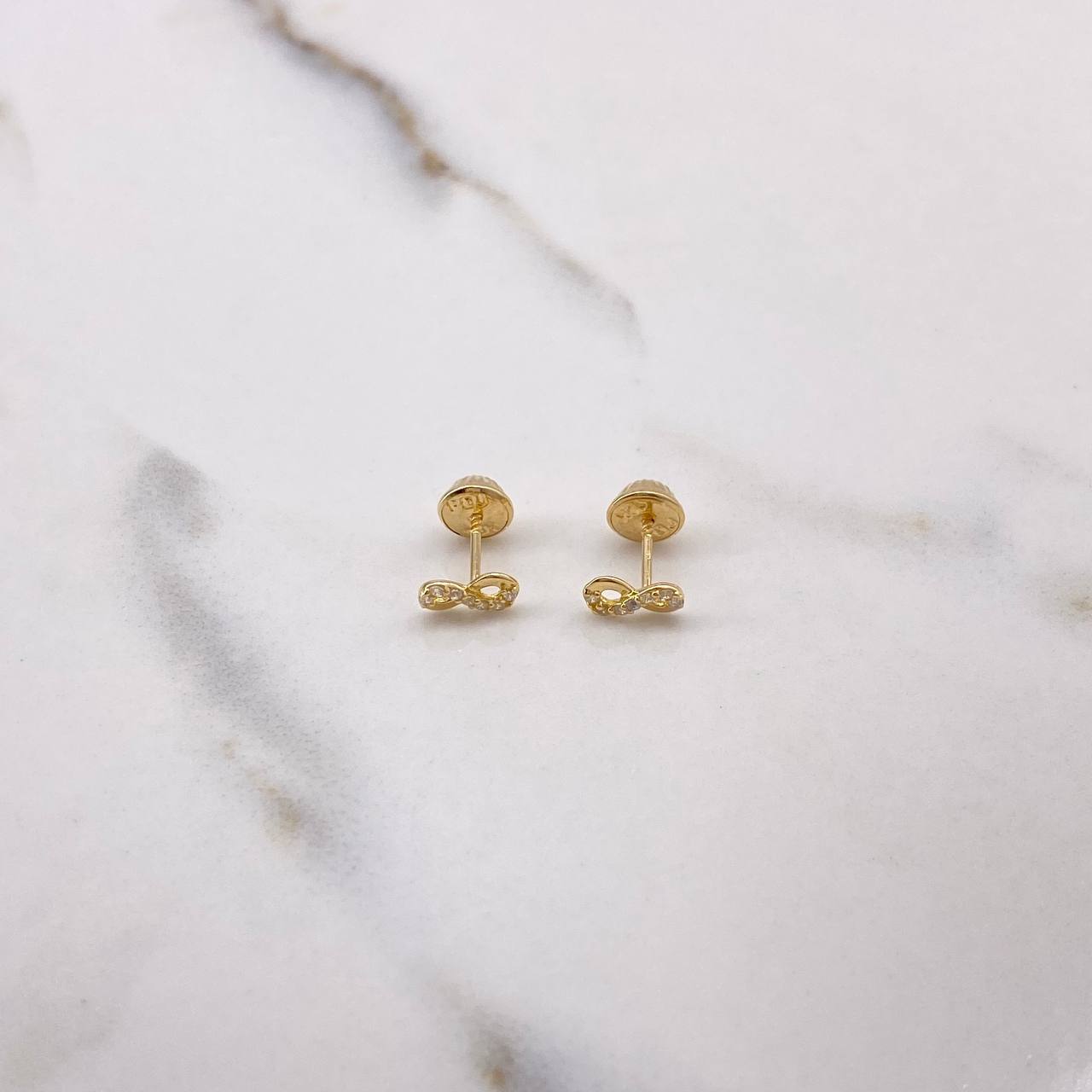 Topos Infinito 0.65gr / Circones Blancos Oro Amarillo 18K &