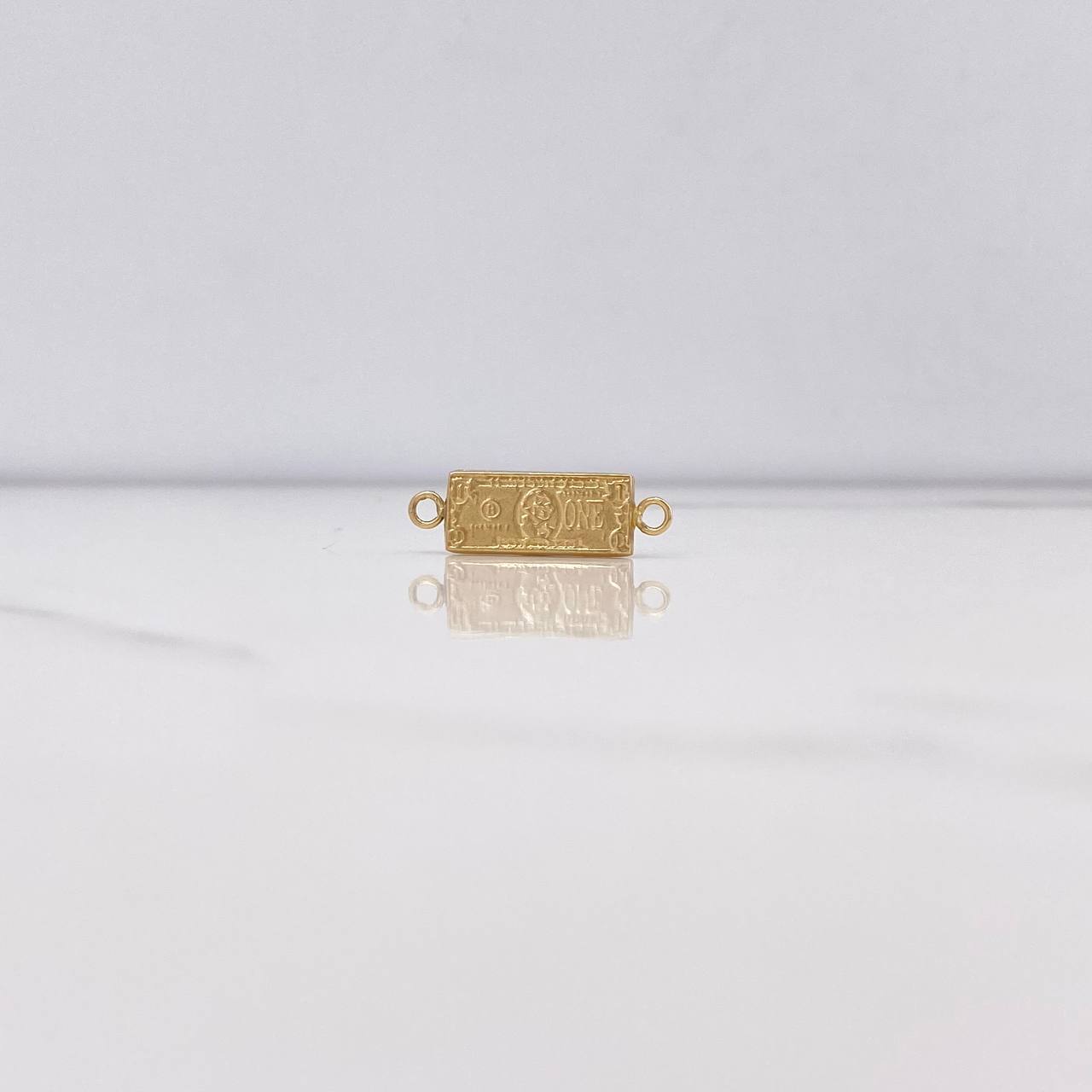Herraje One Dólar 0.85gr / 1.3cm / Oro 18K