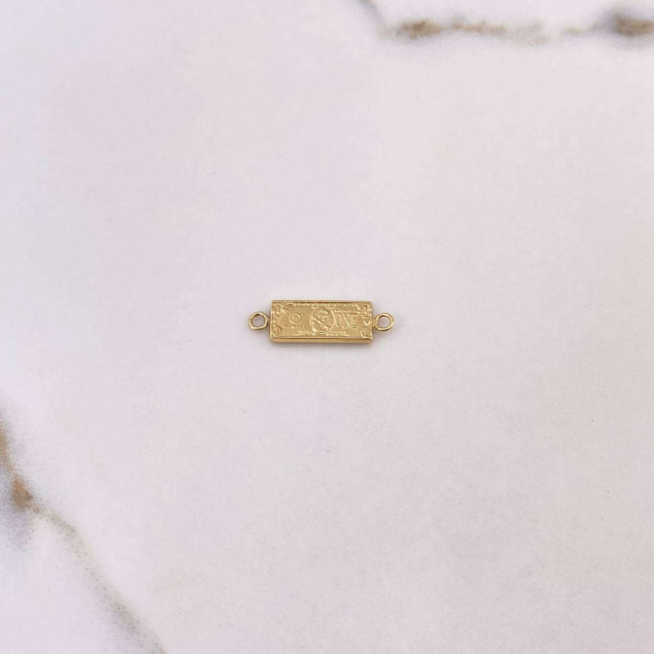 Herraje One Dólar 0.85gr / 1.3cm / Oro 18K