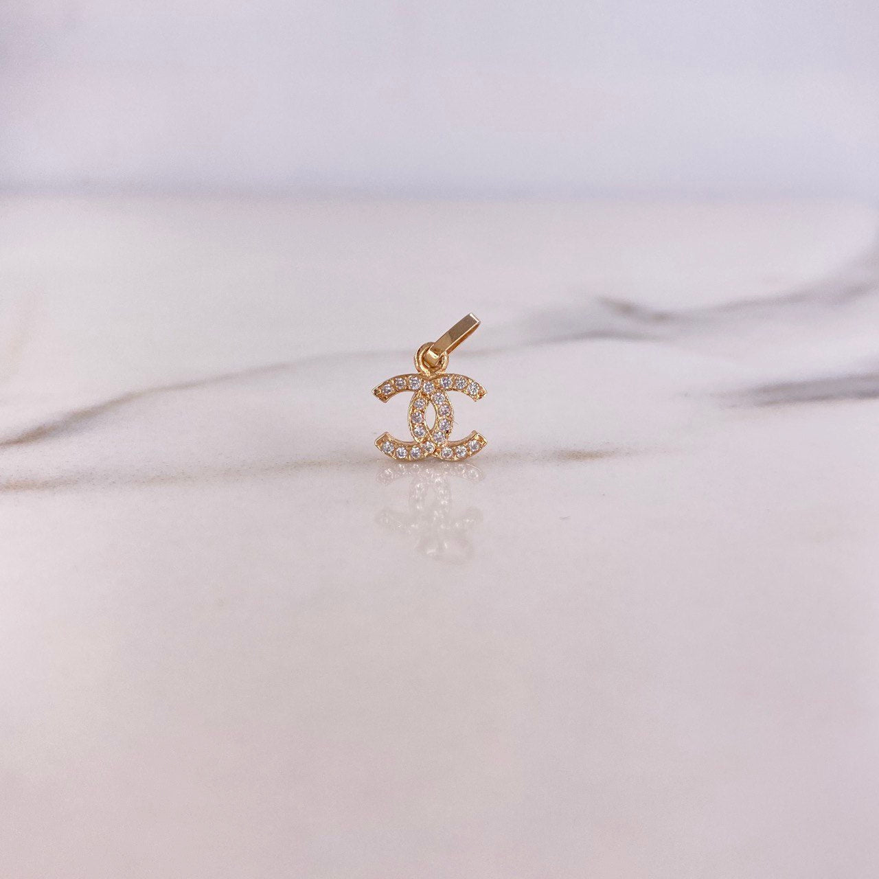 Pendant CC 0.5gr / 1.4cm / White Zirconia Yellow Gold $