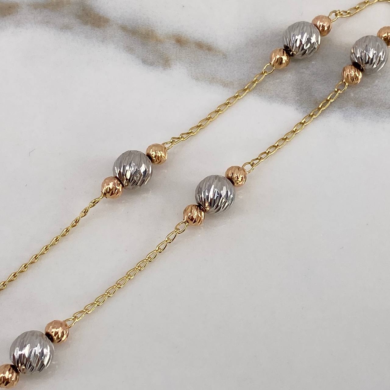 Espiga Chain 5.7gr / 45cm / Beads 4-7mm Diamond Cut Three Golds $