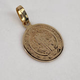 Dije San Benito  1.35gr / 2cm / Liso Oro Amarillo$