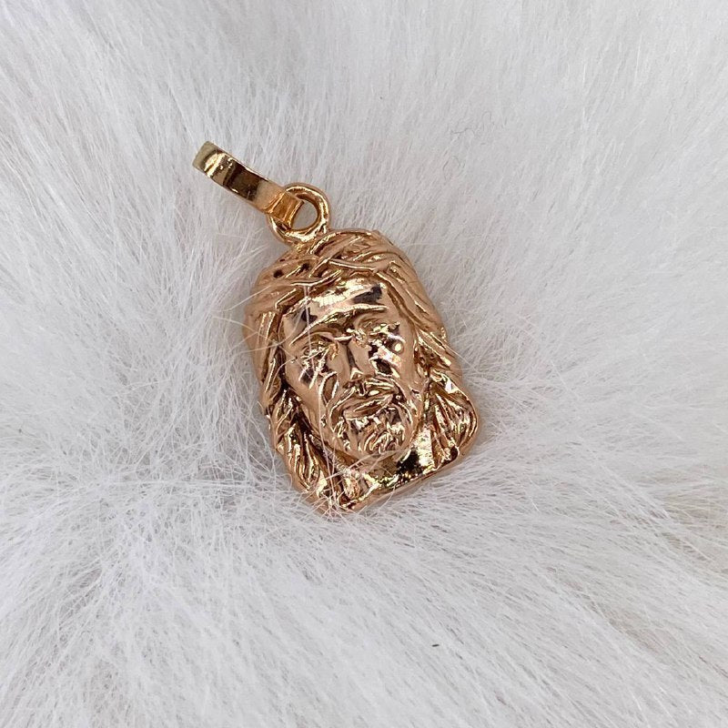 Dije Rostro Cristo  1.65gr / 2cm / Liso  Oro Rosa $