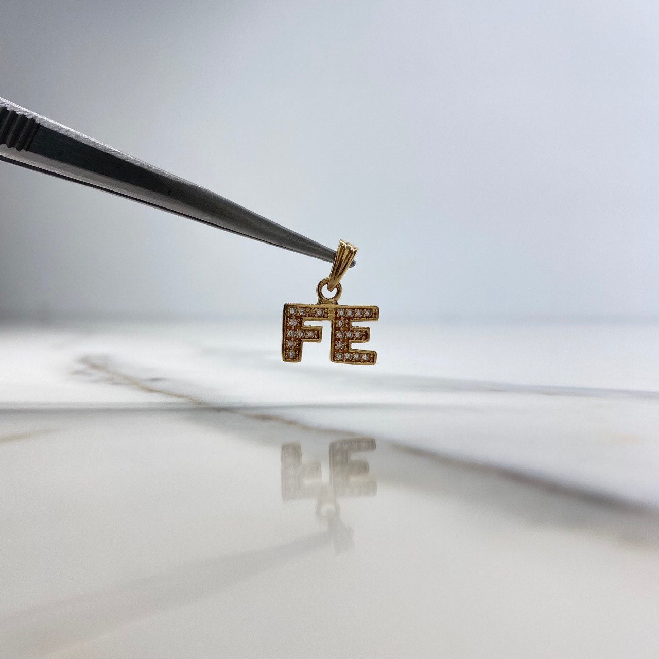 Pendant Fe 1gr / 1.5cm / White Zircons Yellow Gold &
