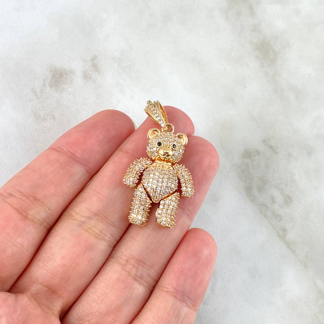 Dije Oso Articulado Corbatín 10.6gr / 4cm / Circones Blancos Ojos Negros Oro Amarillo 18K ©