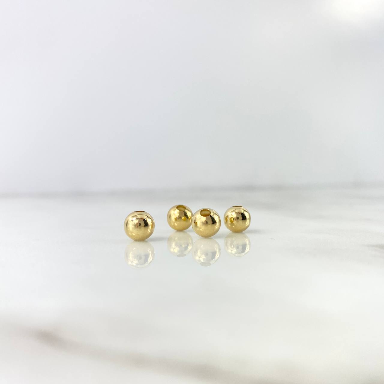 Bola Lisa 6mm  Oro Amarillo 18K *