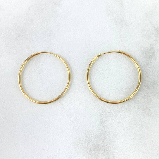 Plain Hoop Earrings 1.05gr / 1 in / 18K Yellow Gold ©