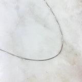 Cadena Veneciana 2.1gr / 15 3/4 in / 0.9mm Oro Blanco +3 18K *