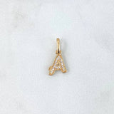 Dije Letra A Silueta 0.65gr / 1.6cm / Circones Blancos Oro Amarillo 18K ©
