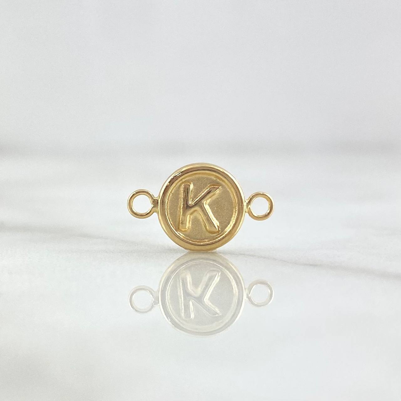 Herraje Letra K 0.35gr / 1.2cm / Circulo Mate Oro Amarillo