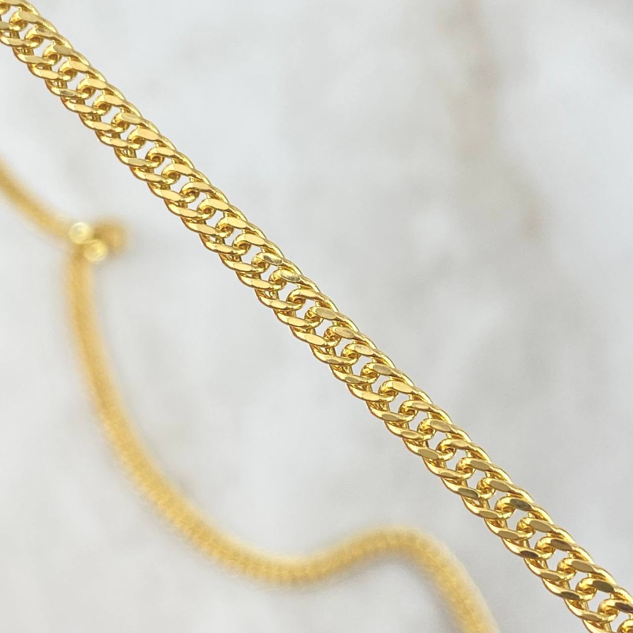 Cadena Cubana Reticulada 7.4gr / 23 1/2 in / Oro Amarillo +3 18K
