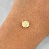 Herraje San Benito 0.55gr / 1.7cm / Troquelado Oro Amarillo 18K