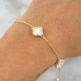 Pulso Trebol Nacar Blanco 4.5gr / 7 1/4 in / 10mm Oro Amarillo Nac.Esp. 18K ©