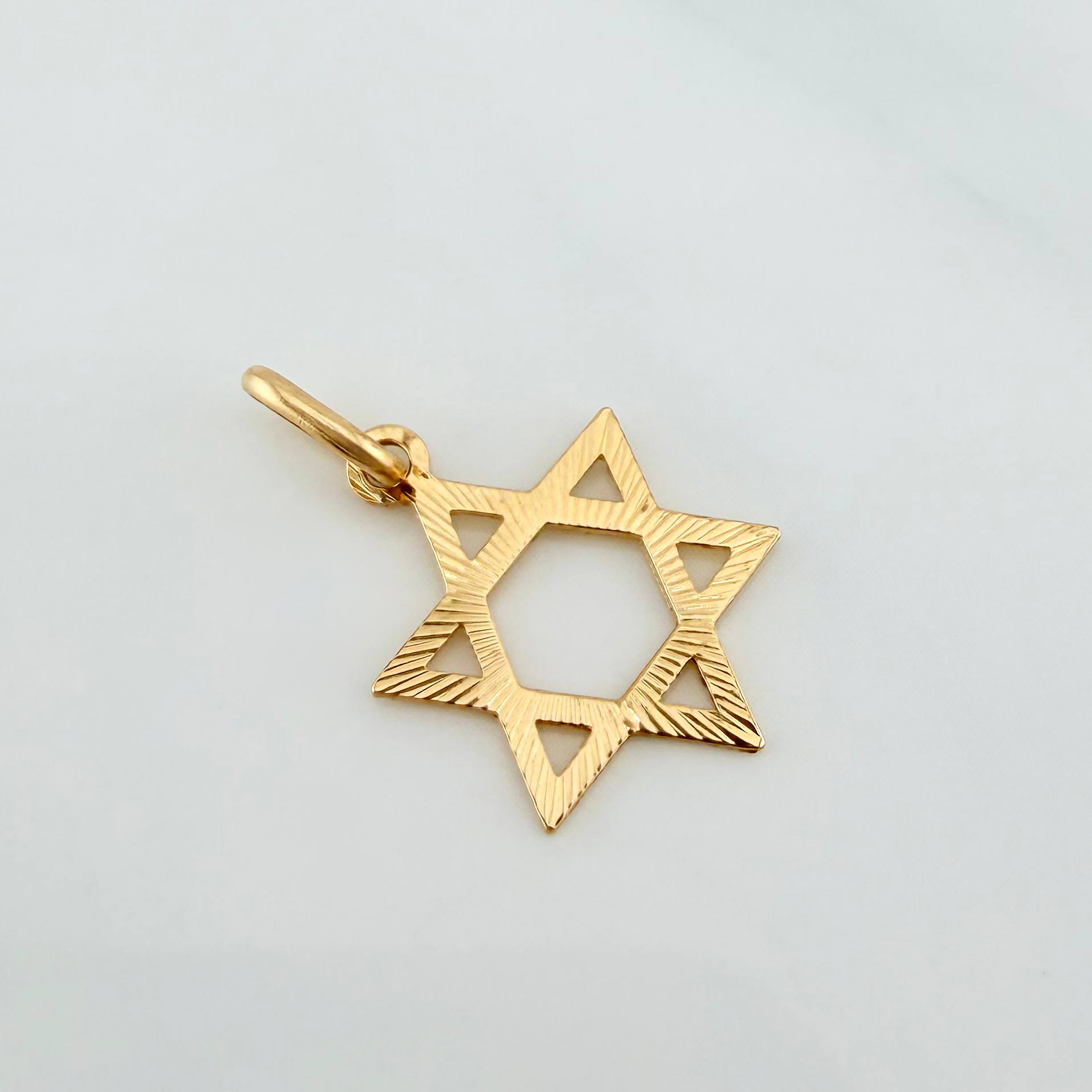 Dije Estrella De David 0.7 g / 3/4 in Oro Amarillo 18K