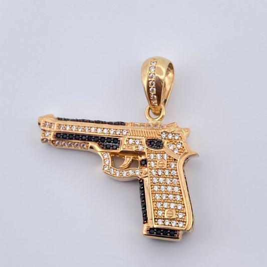 Dije Pistola 10.8gr / 1 1/2 in / Dos Oros Negro Amarillo 18K %