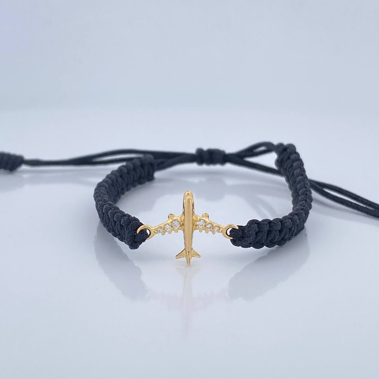 Pulsera Tejida Negra Avión 0.6gr / Oro Amarillo 18K %