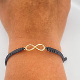Pulsera Tejida Negra Infinito 0.85gr / Oro Amarillo 18K %