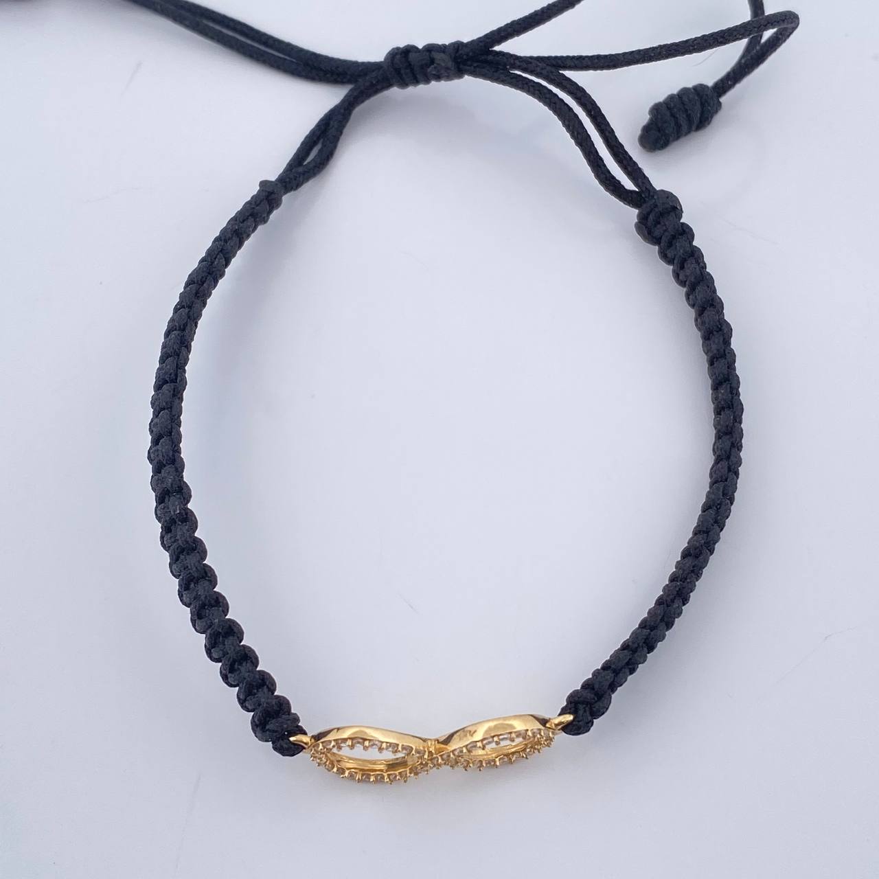 Pulsera Tejida Negra Infinito 0.85gr / Oro Amarillo 18K %