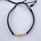 Pulsera Tejida Negra Infinito 0.85gr / Oro Amarillo 18K %