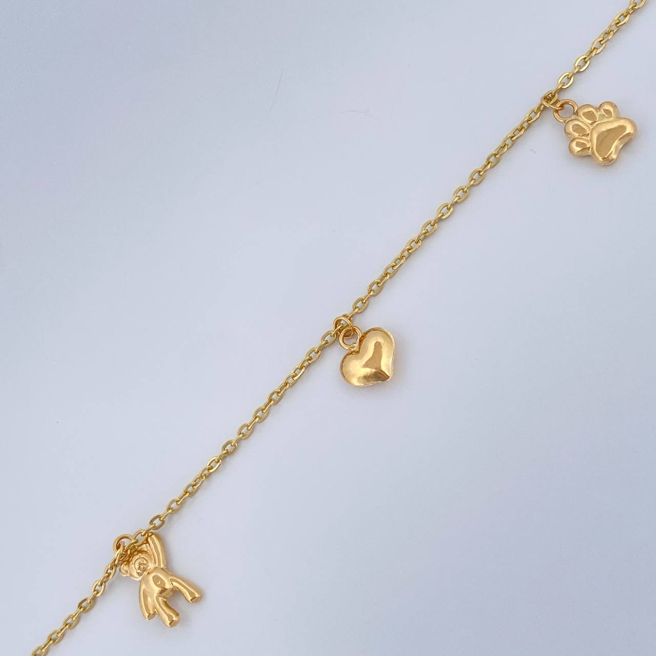 Tobillera Aro Seguido Figuras 3.7gr / 10 1/4 in / 2mm Oro Amarillo 18K &