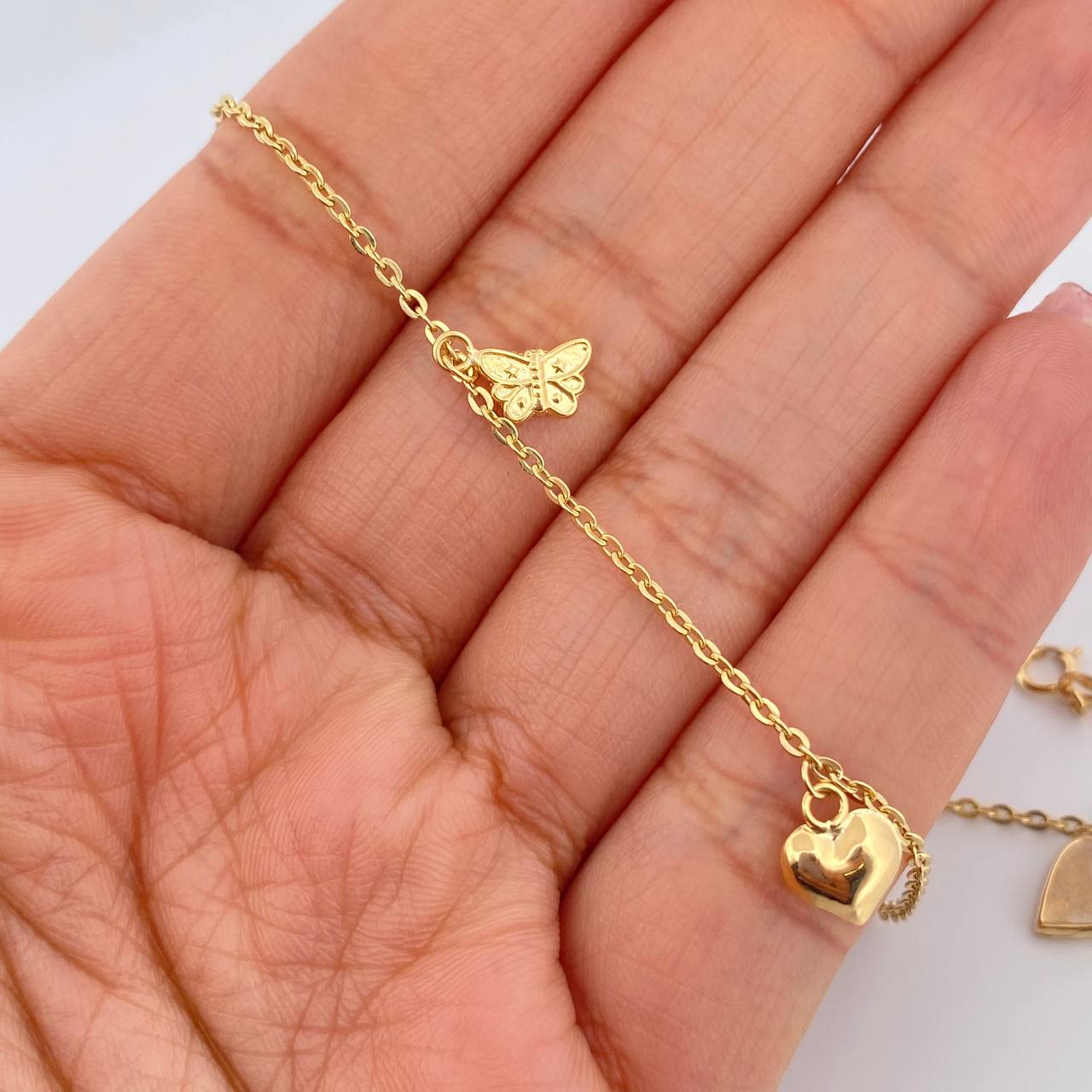 Tobillera Aro Seguido Figuras 3.7gr / 10 1/4 in / 2mm Oro Amarillo 18K &