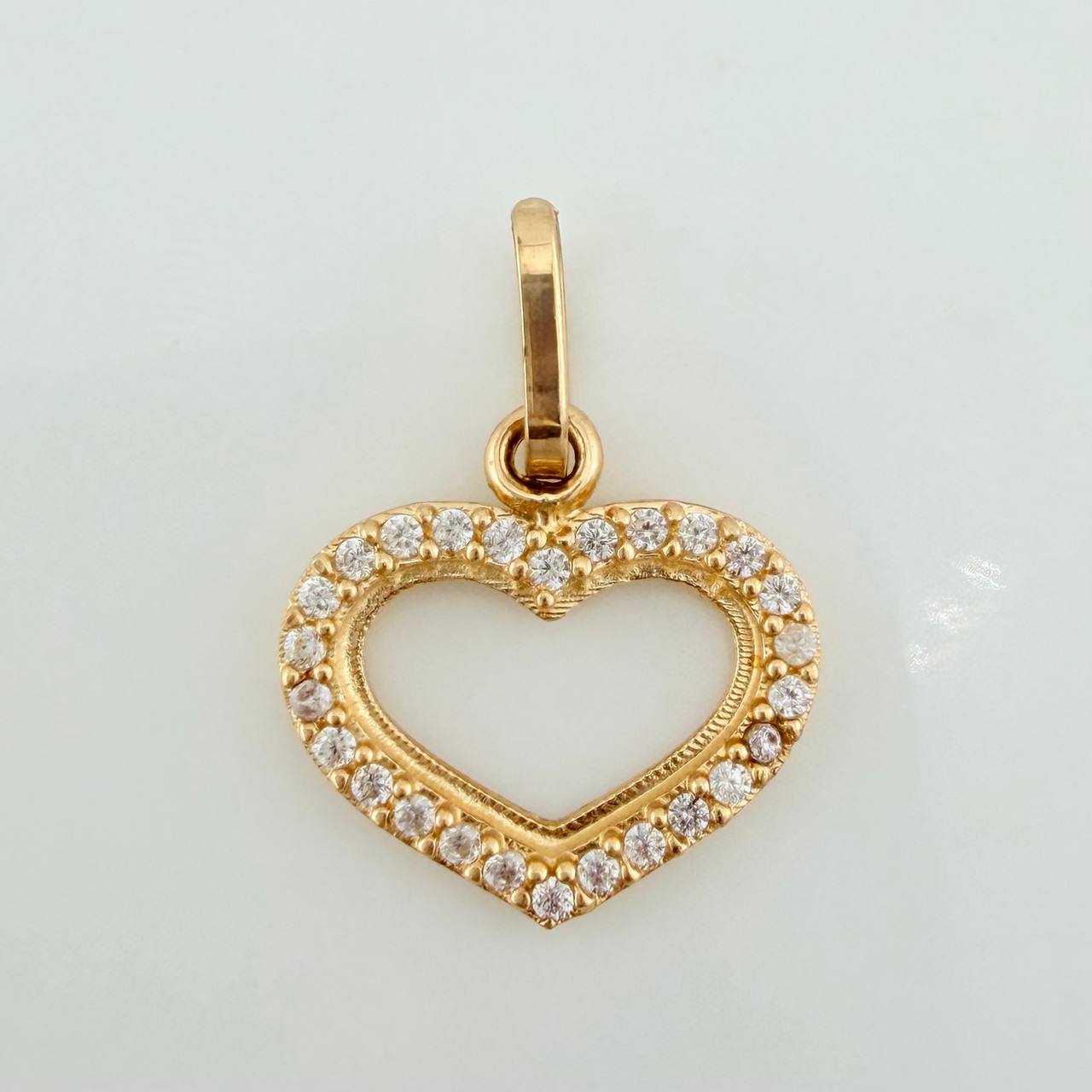 Dije Silueta Corazon 0.85gr / 1/2 in / Oro Amarillo 18K &