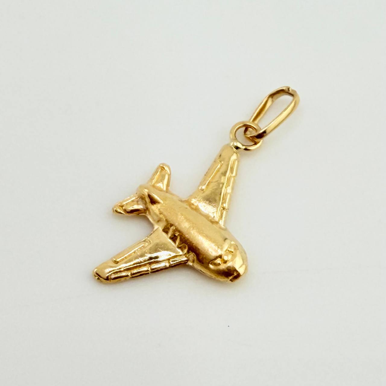 Dije Avion 0.55 g / 3/4 in Oro Amarillo 18K