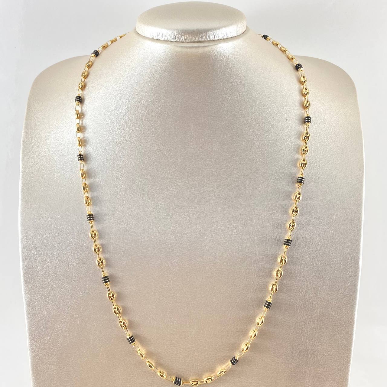 Cadena Gc Barril Cauchos Negros 9.75gr / 23 1/2 in / 4.5mm Oro Amarillo 18K