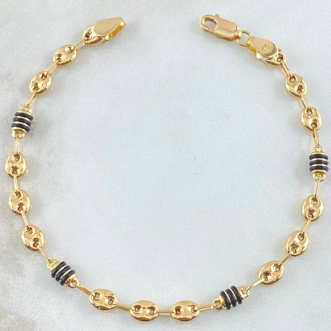 Bracelet Gc Barrel Black Rubbers 3.15gr / 8 in / 4.5mm 18K Yellow Gold ©