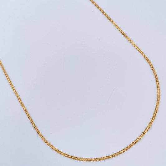 Cadena China 3.1gr / 23 1/2 in / 1.4mm Oro Amarillo +1 18K &