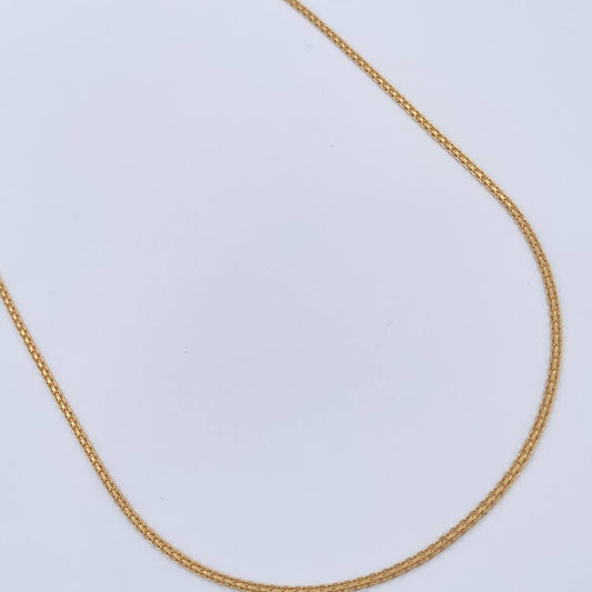 Cadena China 3.05gr / 23 3/4 in / 1.4mm Oro Amarillo +1 18K %