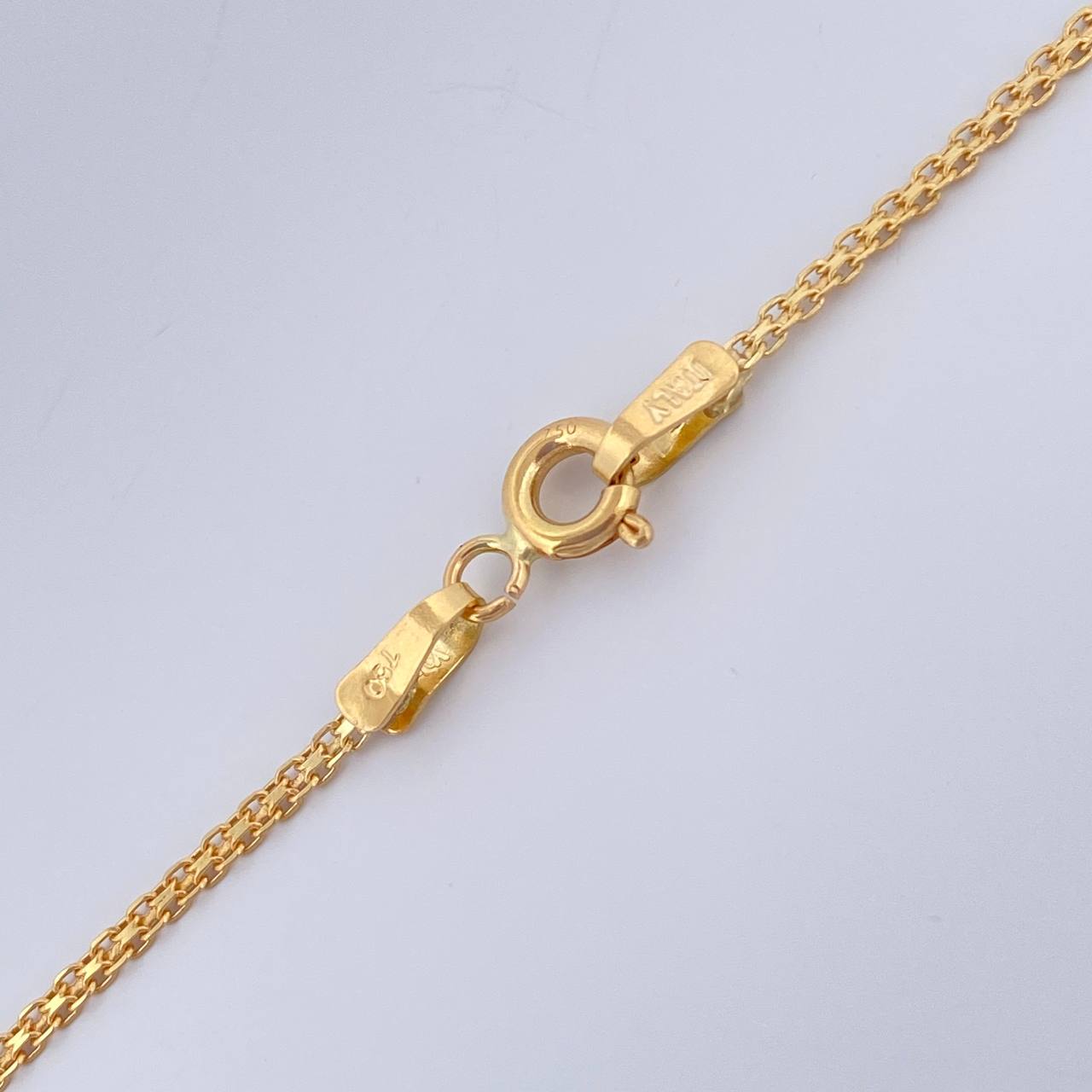 Cadena China 2.95gr / 23 3/4 in / 1.3mm Oro Amarillo +1 18K %