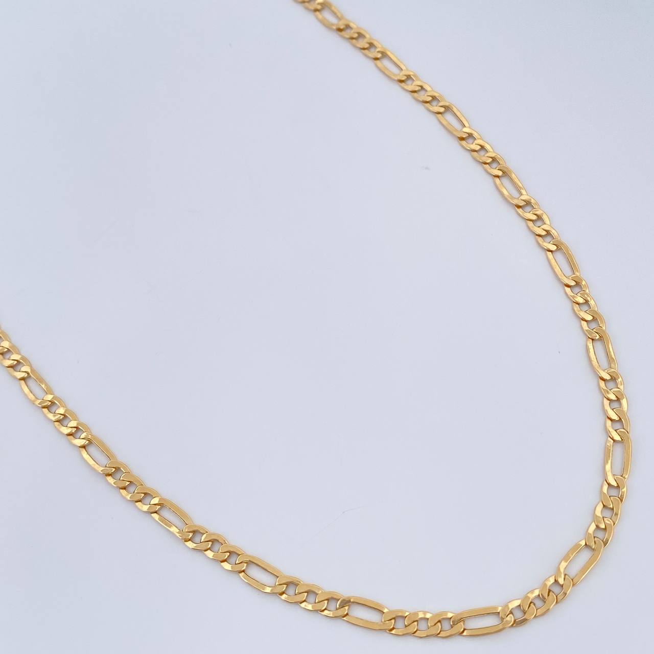 Cadena Figaro 5.8gr / 23 3/4 in / 3.08mm Oro Amarillo +1 18K &