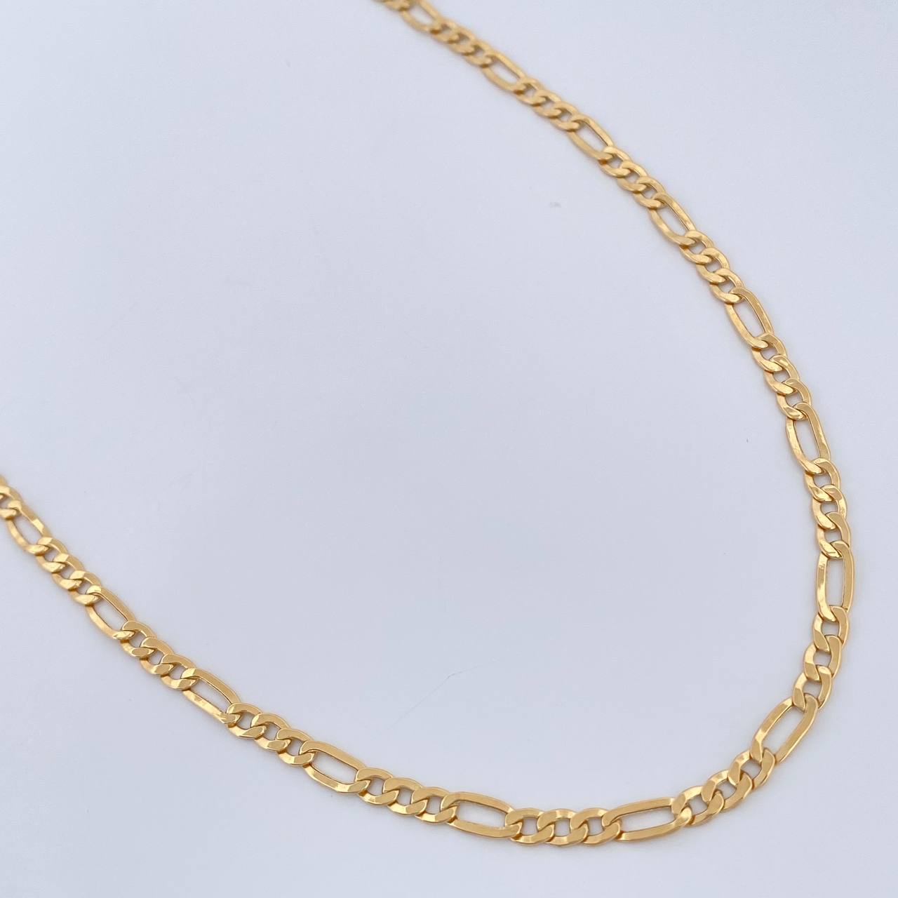 Cadena Figaro 5.35gr / 23 3/4 in / 3.05mm Oro Amarillo +1 18K %