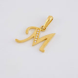 Dije Letra Cursiva M 1.4g / 3/4 in Oro Amarillo 18K