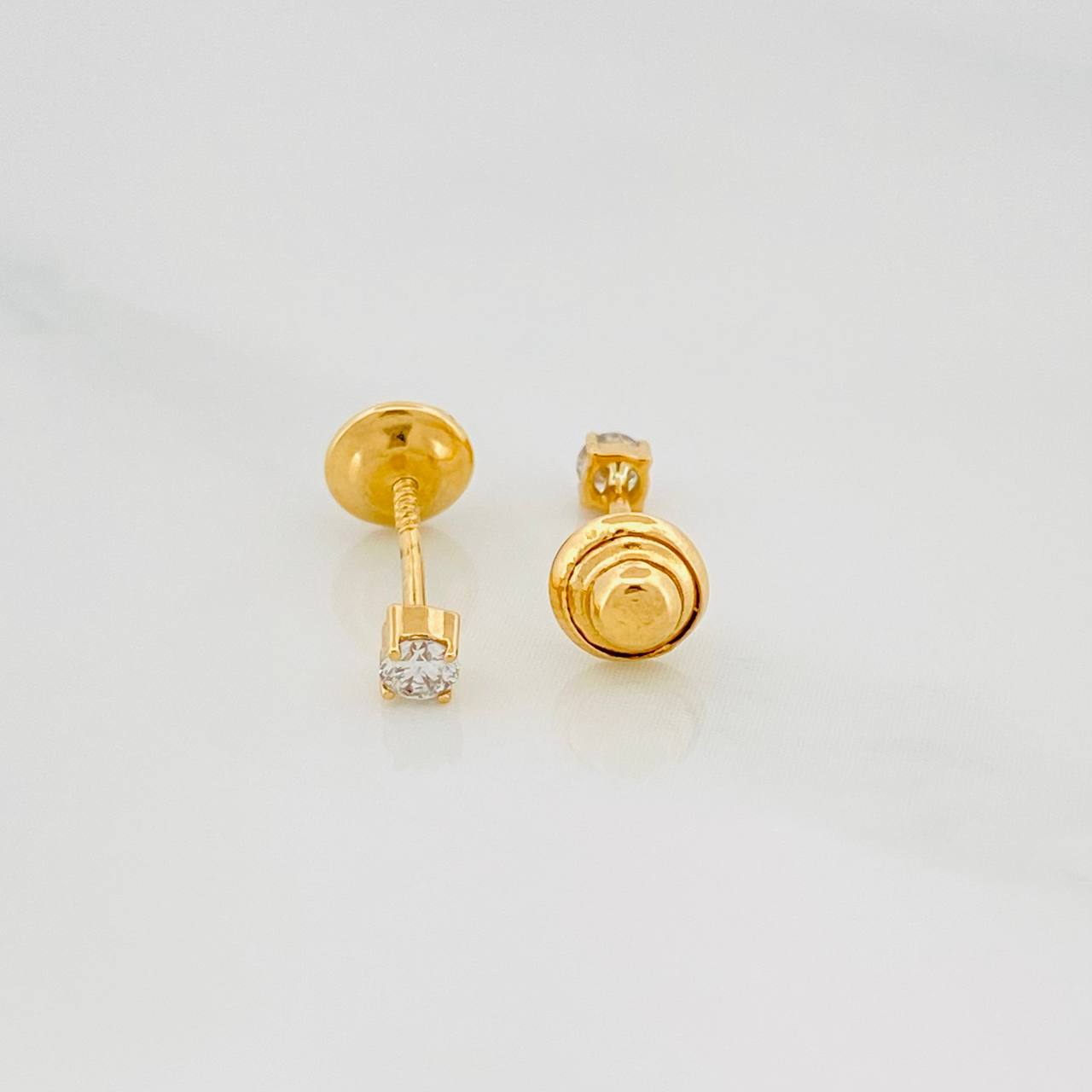 Topos Cuatro Garras Diamantes 10Pts 0.55 g / in / 2.33 mm Oro Amarillo 18K