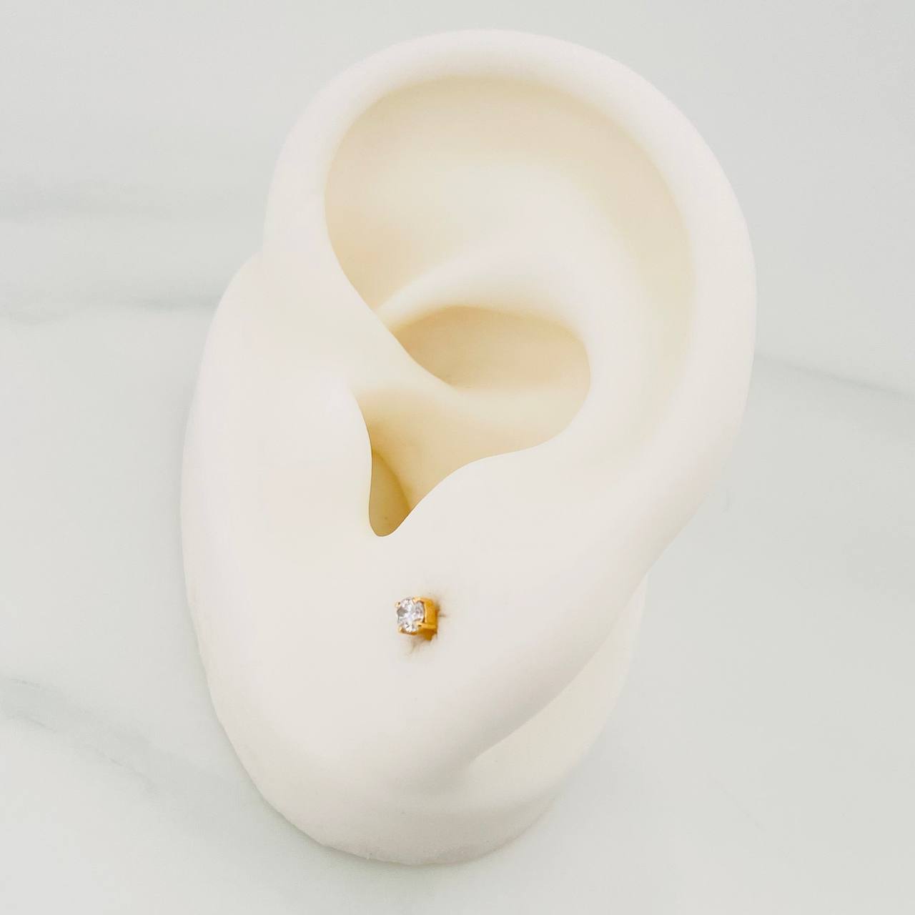 Topos Cuatro Garras Diamantes 10Pts 0.55 g / in / 2.33 mm Oro Amarillo 18K