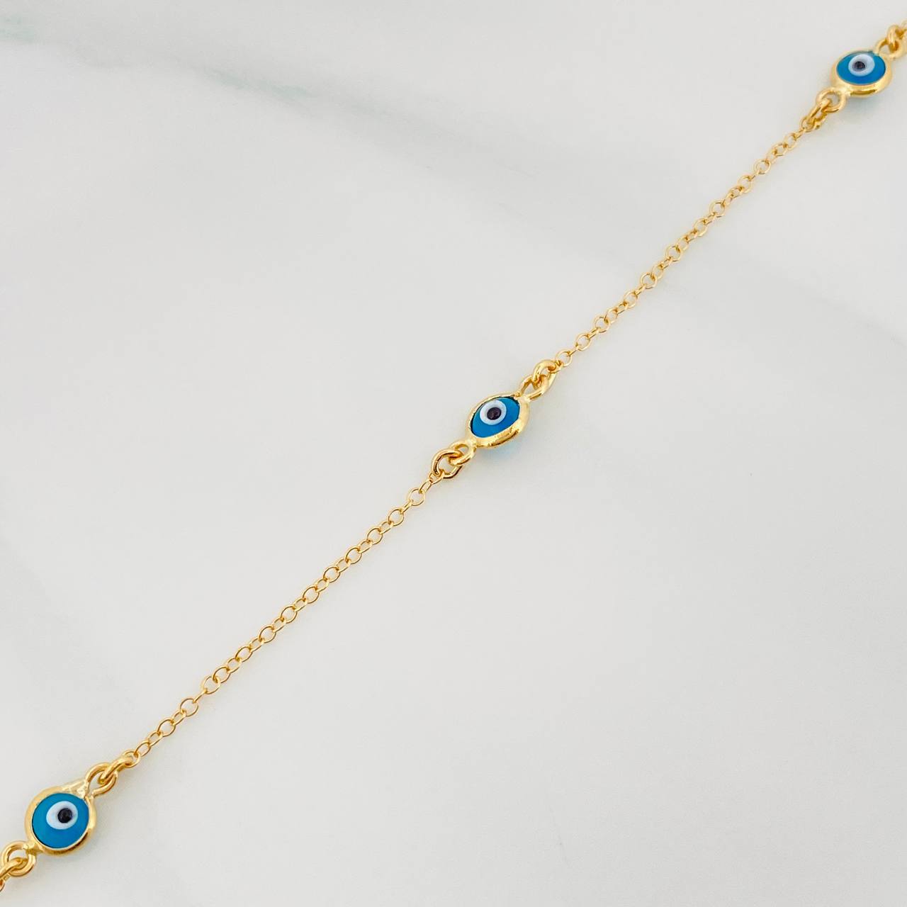 Pulso Aro Seguido Ojo Turco 1.5 g / 7 in / 0.6 mm Oro Amarillo 18K
