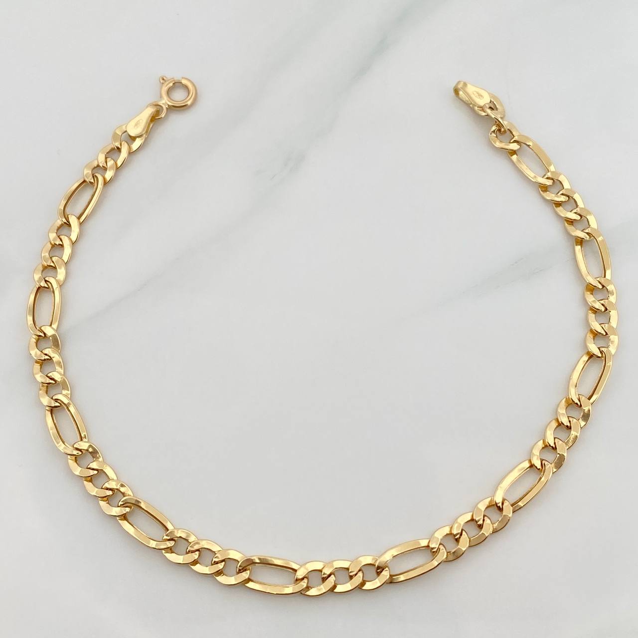Pulso Figaro 2.6gr / 7 3/4 in / 3mm Oro Amarillo +1 18K %