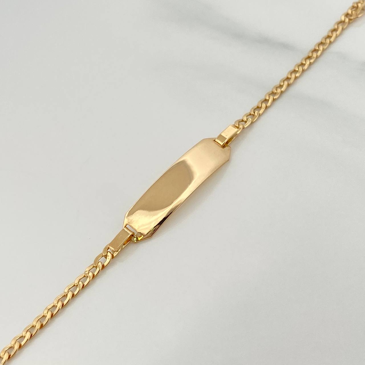 Pulso Bebé Placa Cubana 2.05gr / 5 3/4 in / 1.2mm Oro Amarillo +1 18K %