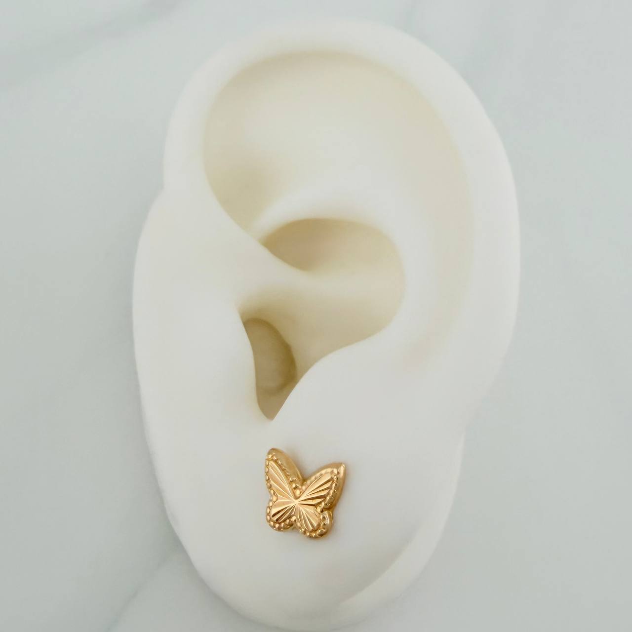 Topos Mariposa 0.85gr / 8mm Oro Amarillo 18K %