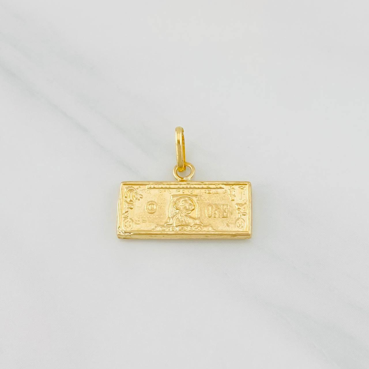 Dije One Dolar 0.65g / 1/2 in Oro Amarillo 18K